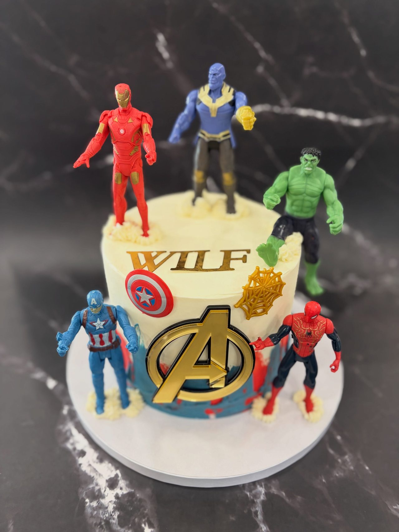 Superhero themed birthday cake