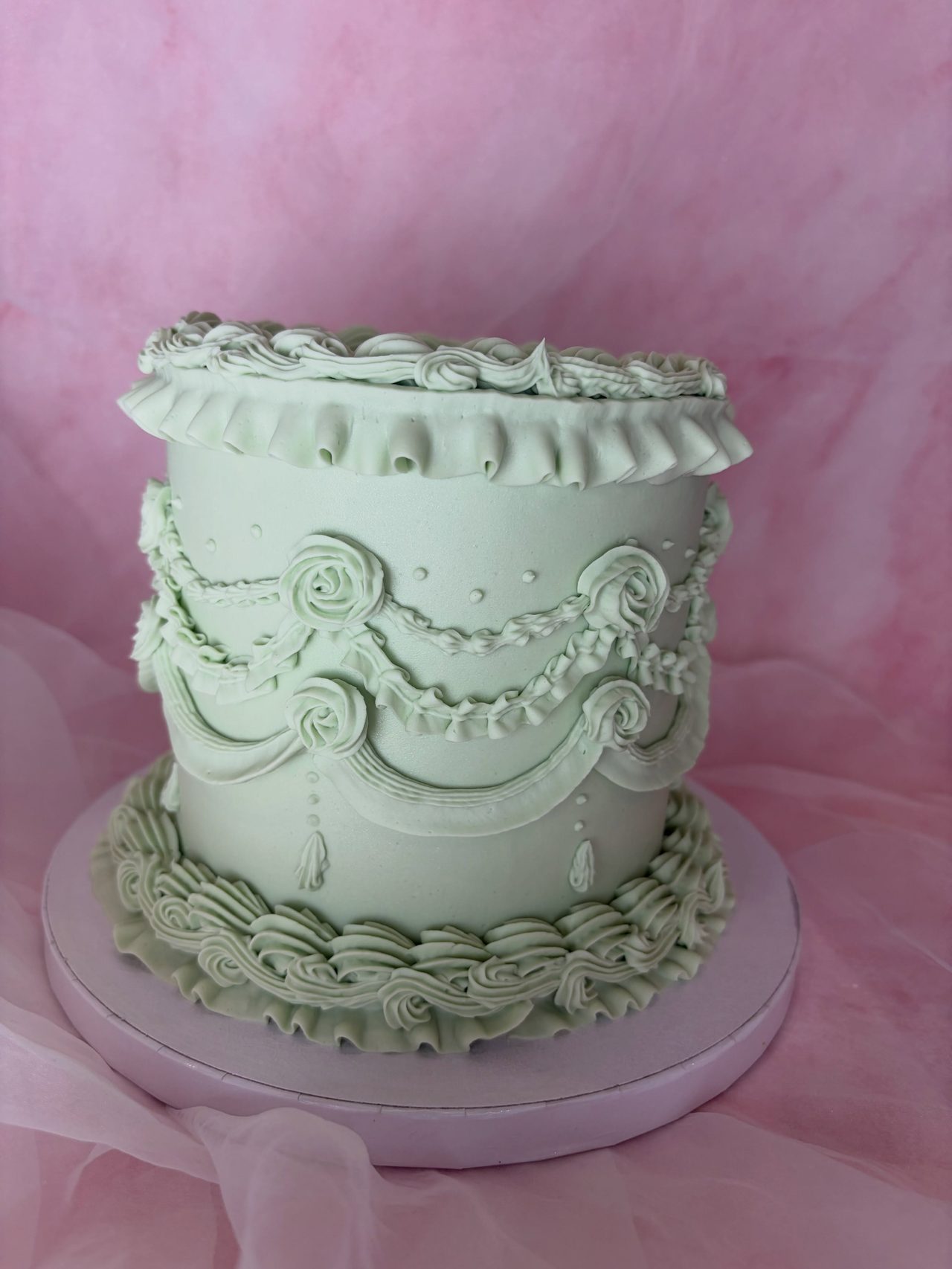 Pale green vintage piped cake