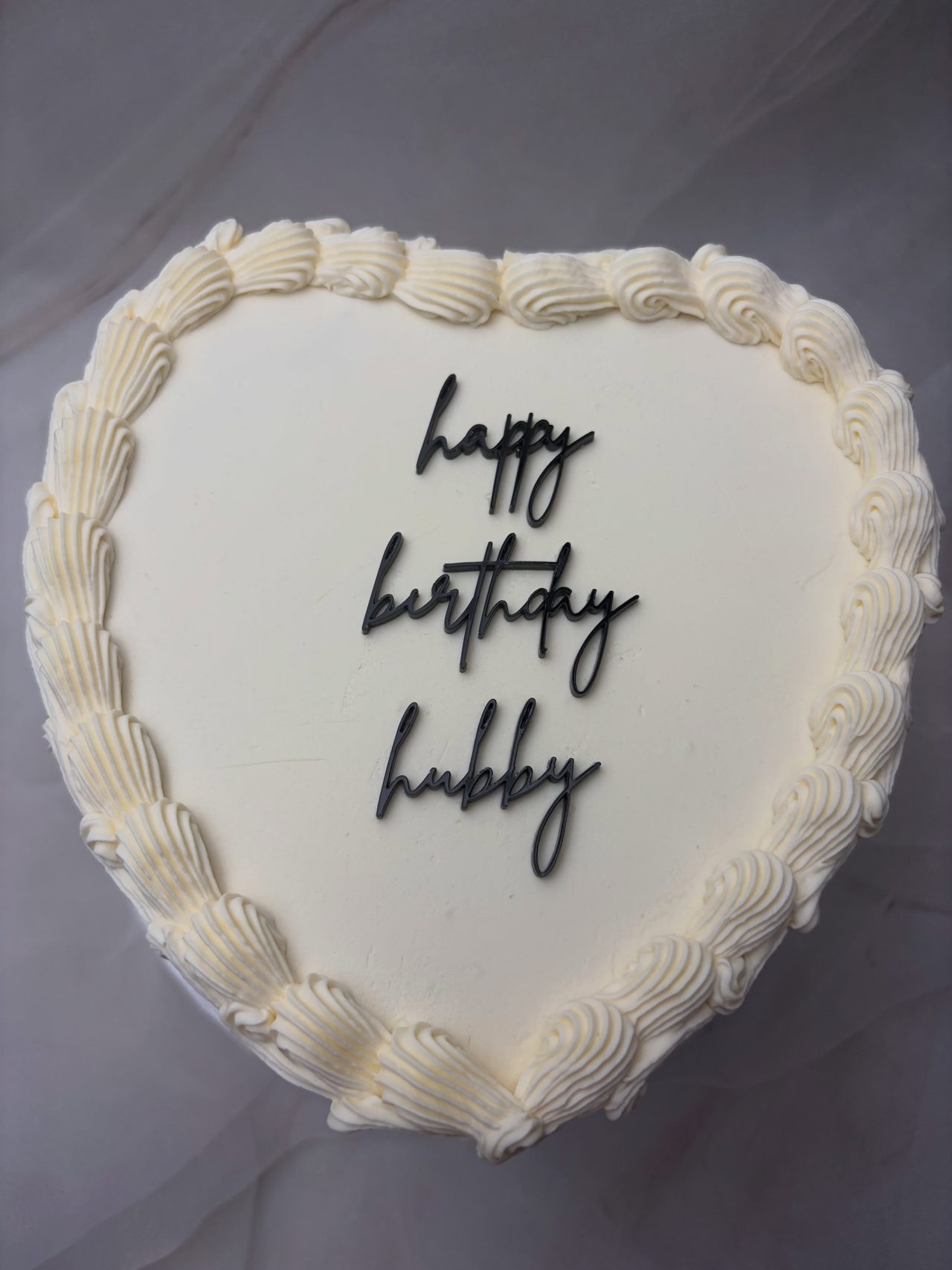 White heart-shaped vintage cake